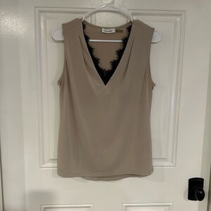 Nude color sleeveless blouse